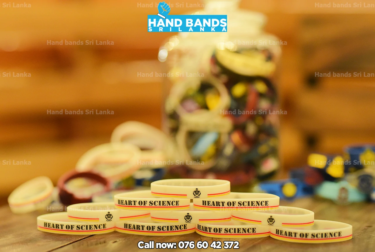 Debossed white/transparant silicone handbands/wristbands, design for school fundraising events in Sri Lanka